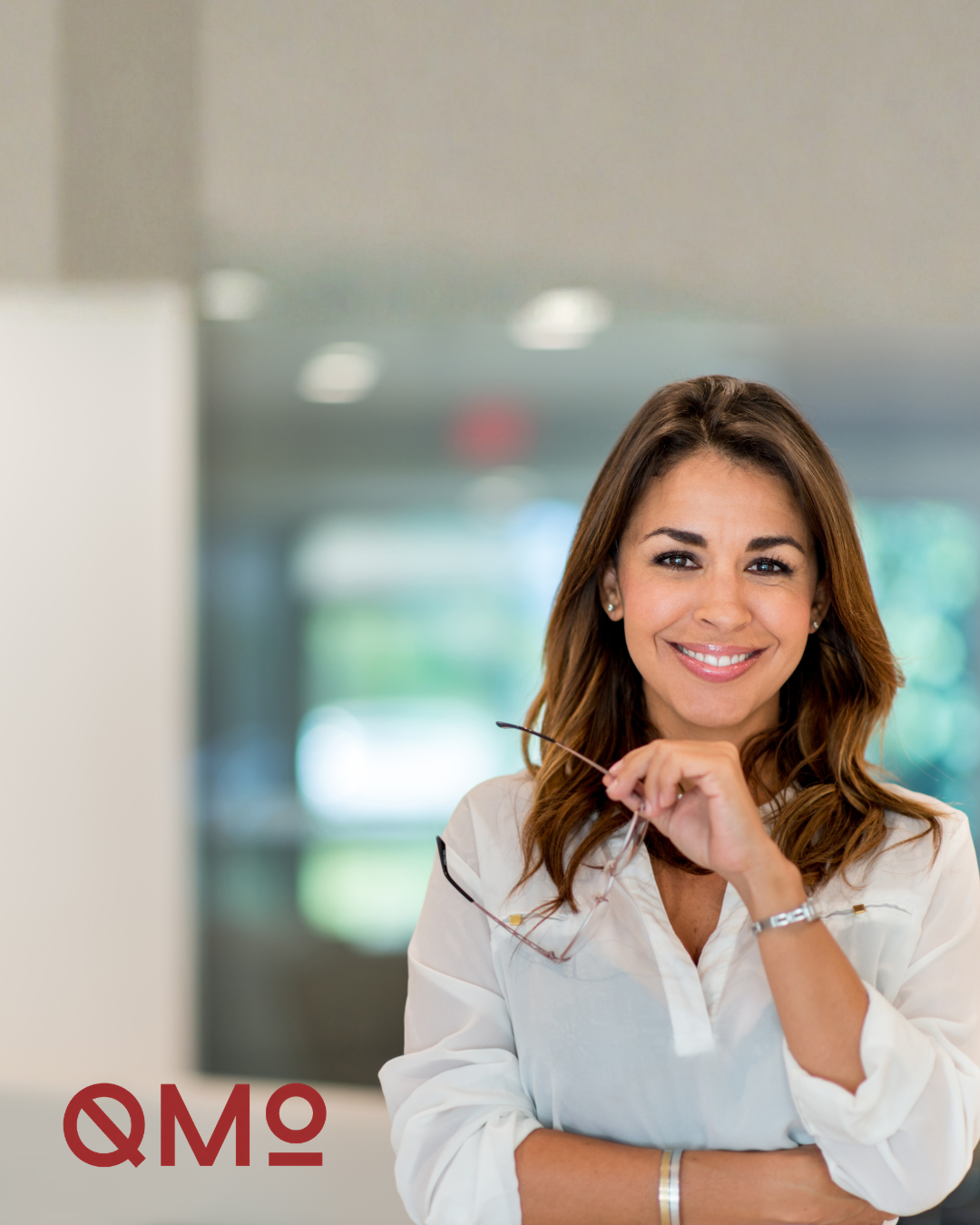 business women with QMO logo